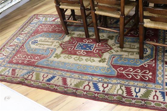 A Kazak style geometric patterned rug W.240 x 150cm